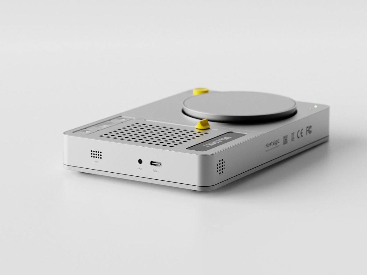 Angled view of a minimalist desktop audio controller
